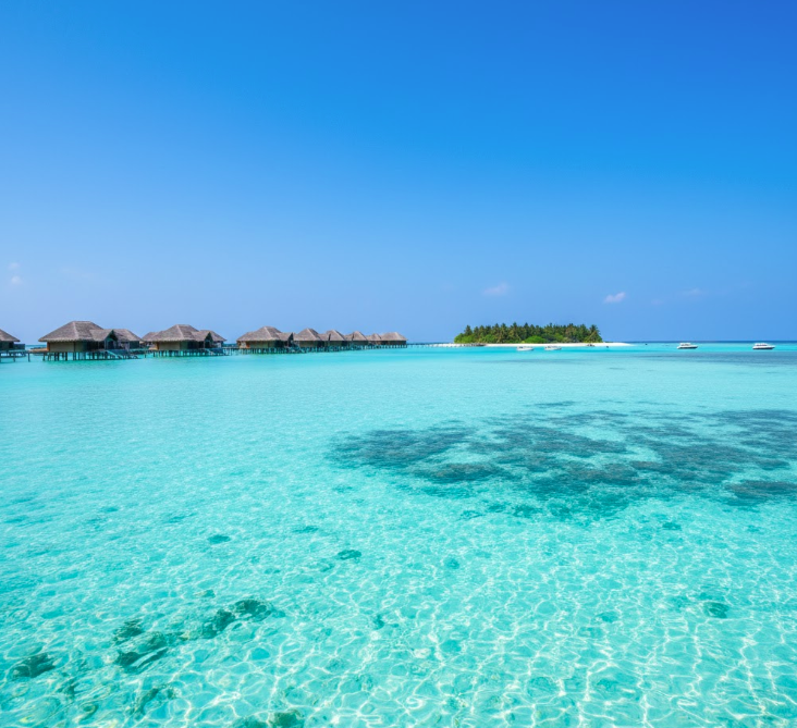 best places to travel in February in the Maldives with clear lagoon and overwater villas